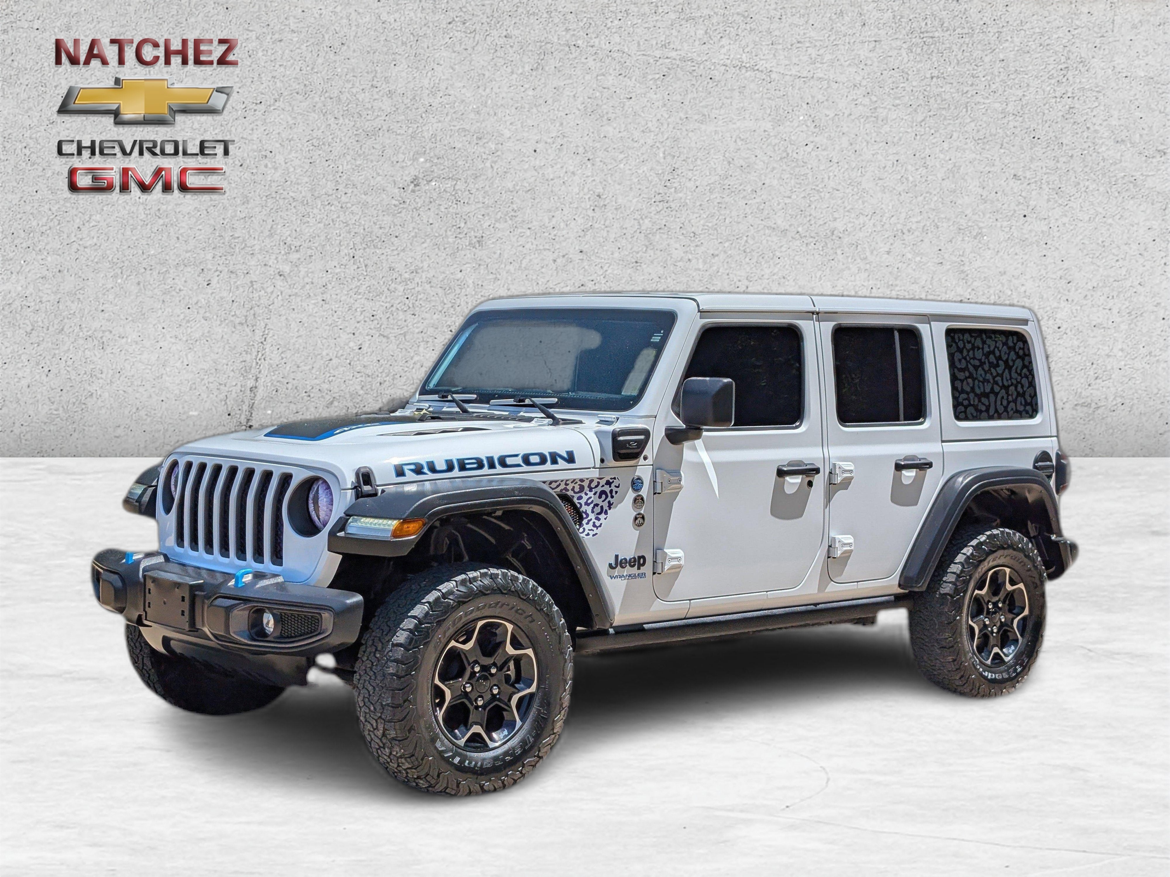 2021 Jeep Wrangler 4xe Unlimited Rubicon in White — front three-quarter view