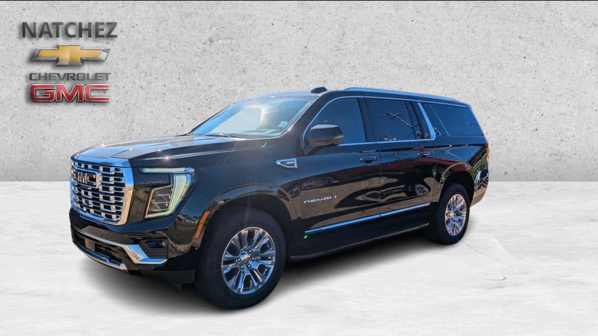 2026 GMC Yukon XL Denali in Onyx Black — front three-quarter view