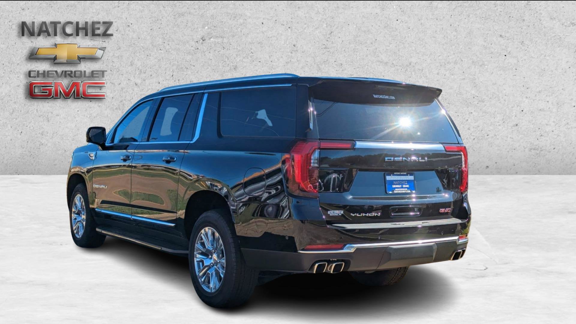 2026 GMC Yukon XL — rear three-quarter view