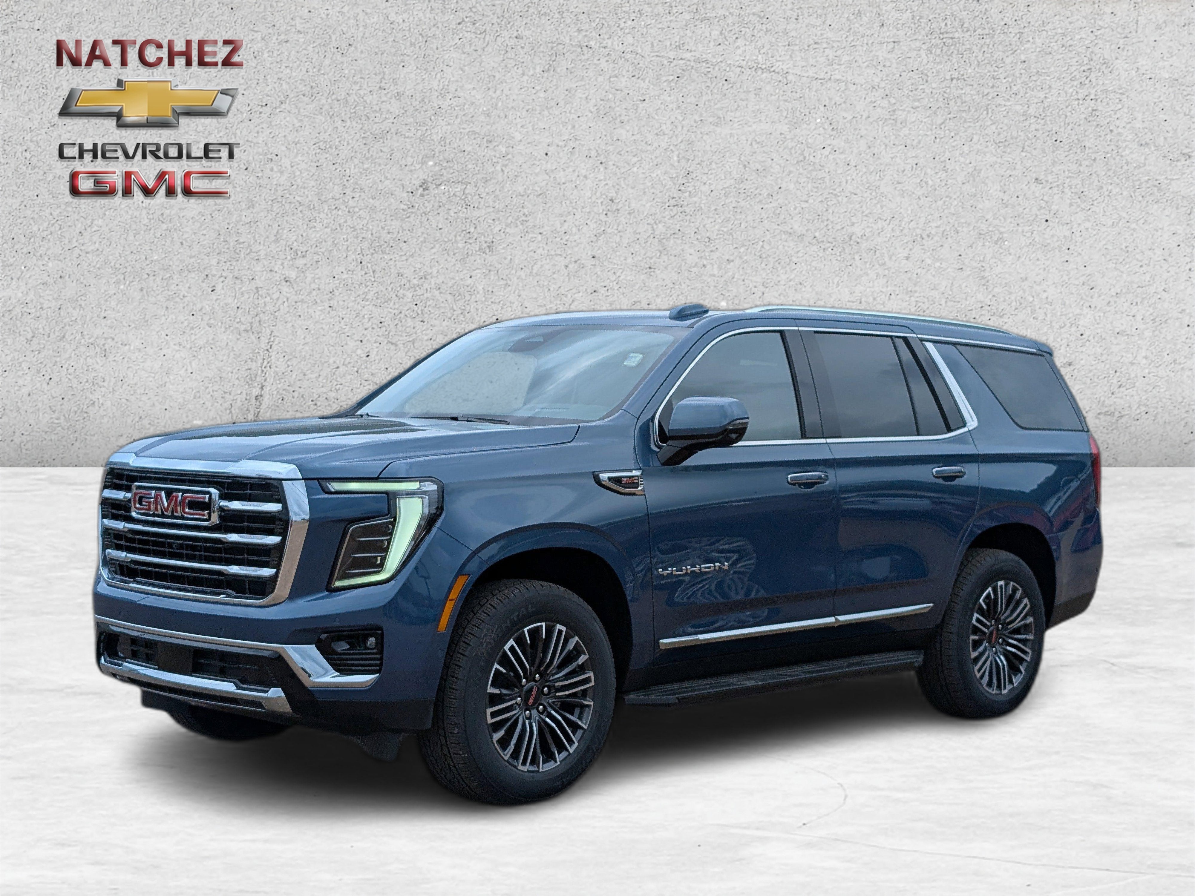2026 GMC Yukon Elevation in Downpour Metallic — front three-quarter view
