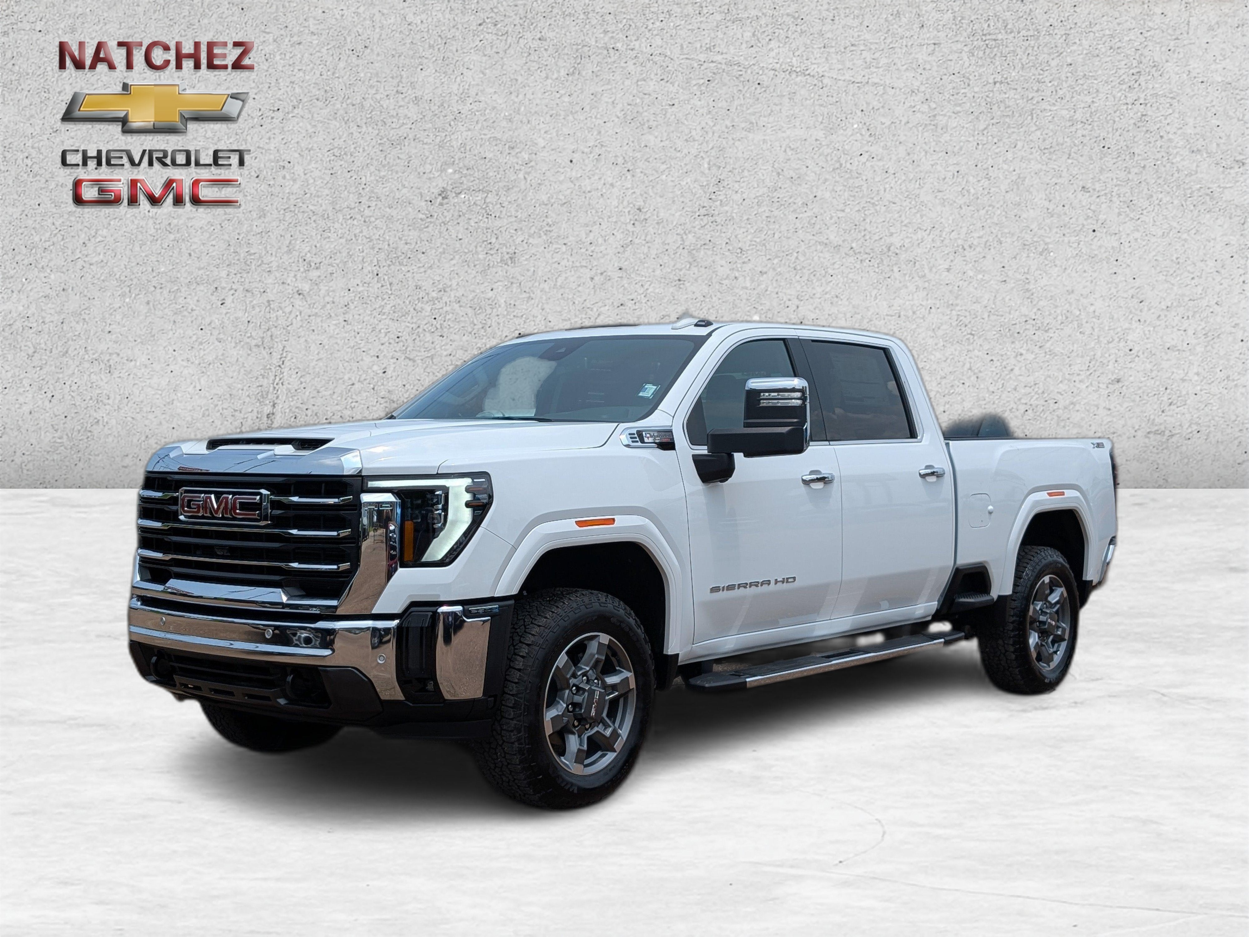 2026 GMC Sierra 2500 HD SLT in Summit White — front three-quarter view