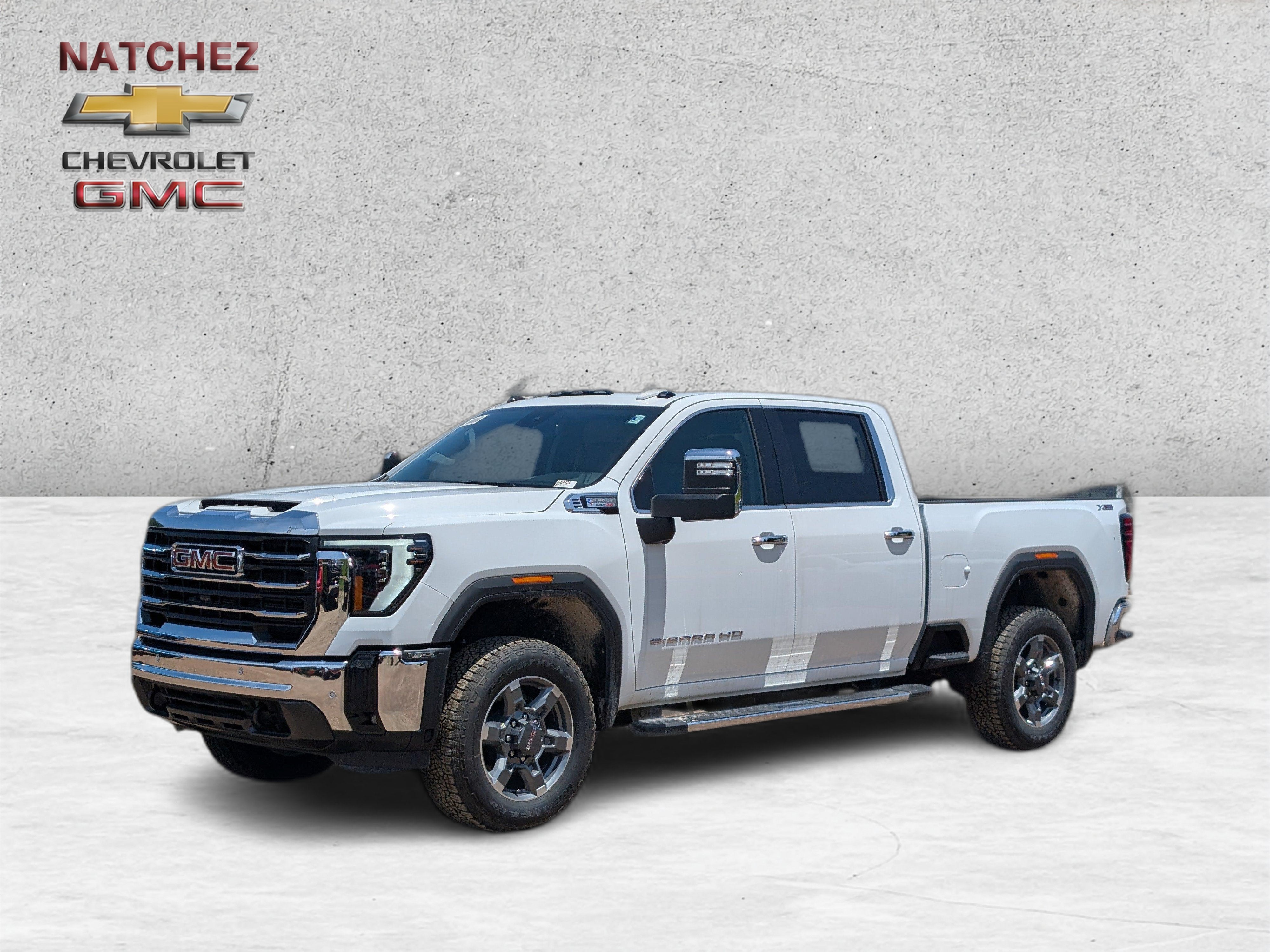 2026 GMC Sierra 2500 HD SLT in Summit White — front three-quarter view