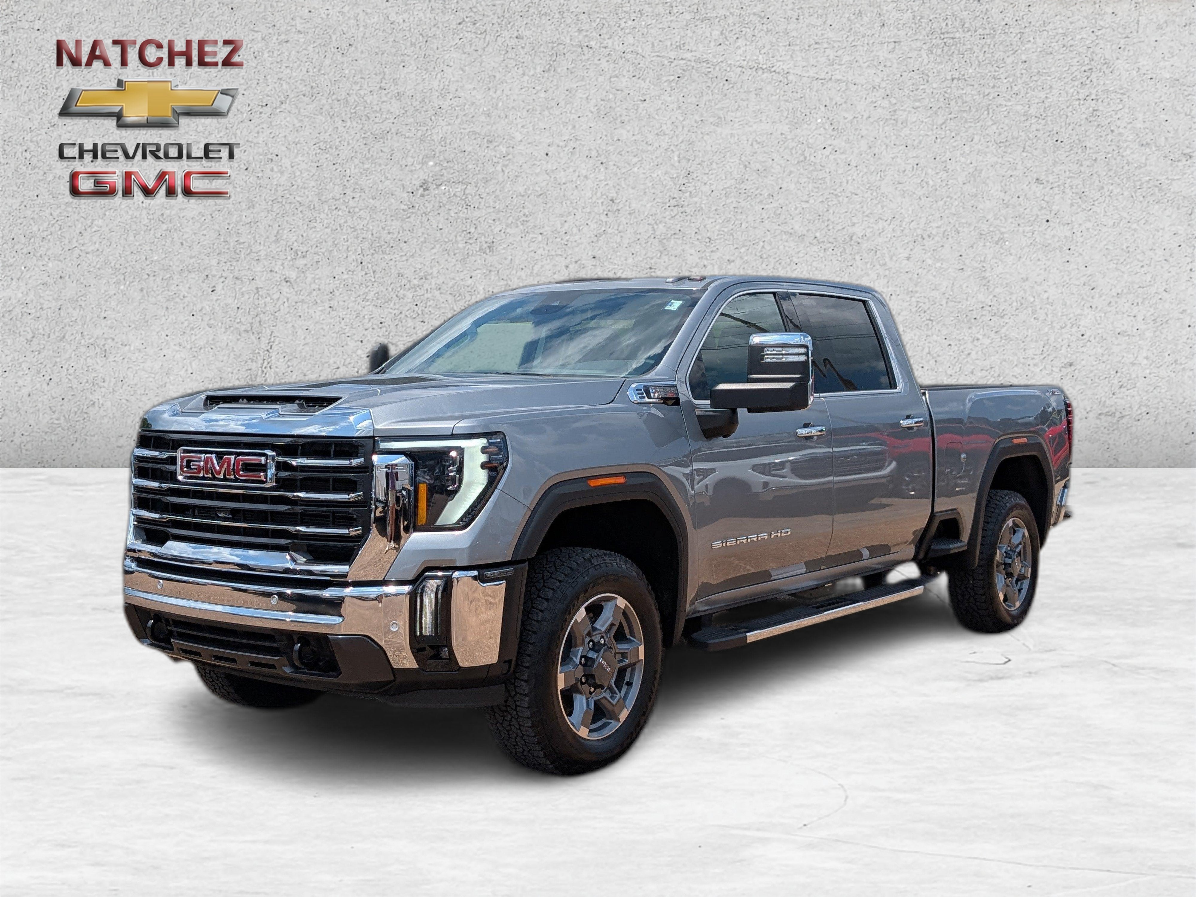 2026 GMC Sierra 2500 HD SLT in Sterling Metallic — front three-quarter view