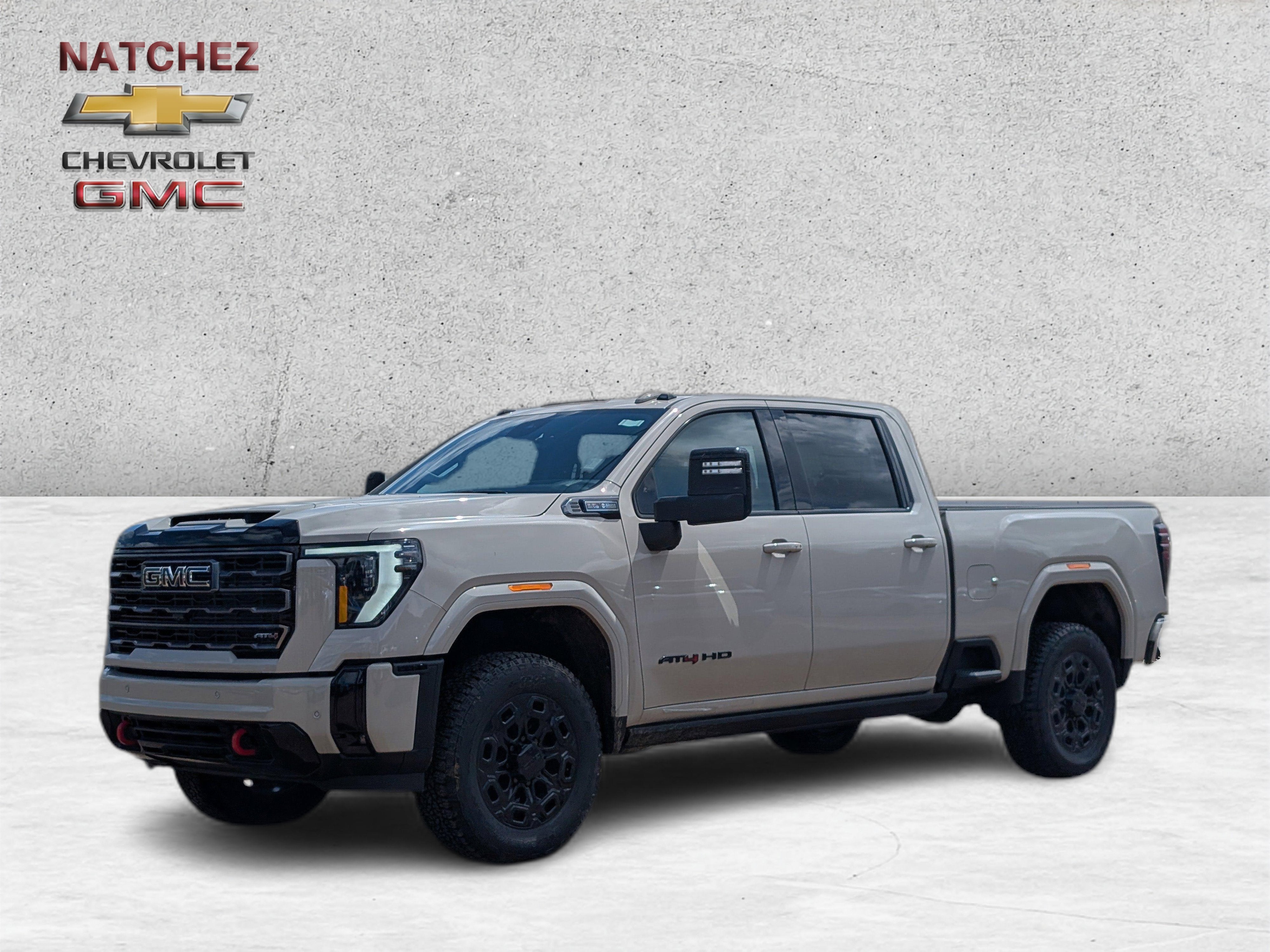 2026 GMC Sierra 2500 HD AT4 in Coastal Dune — front three-quarter view