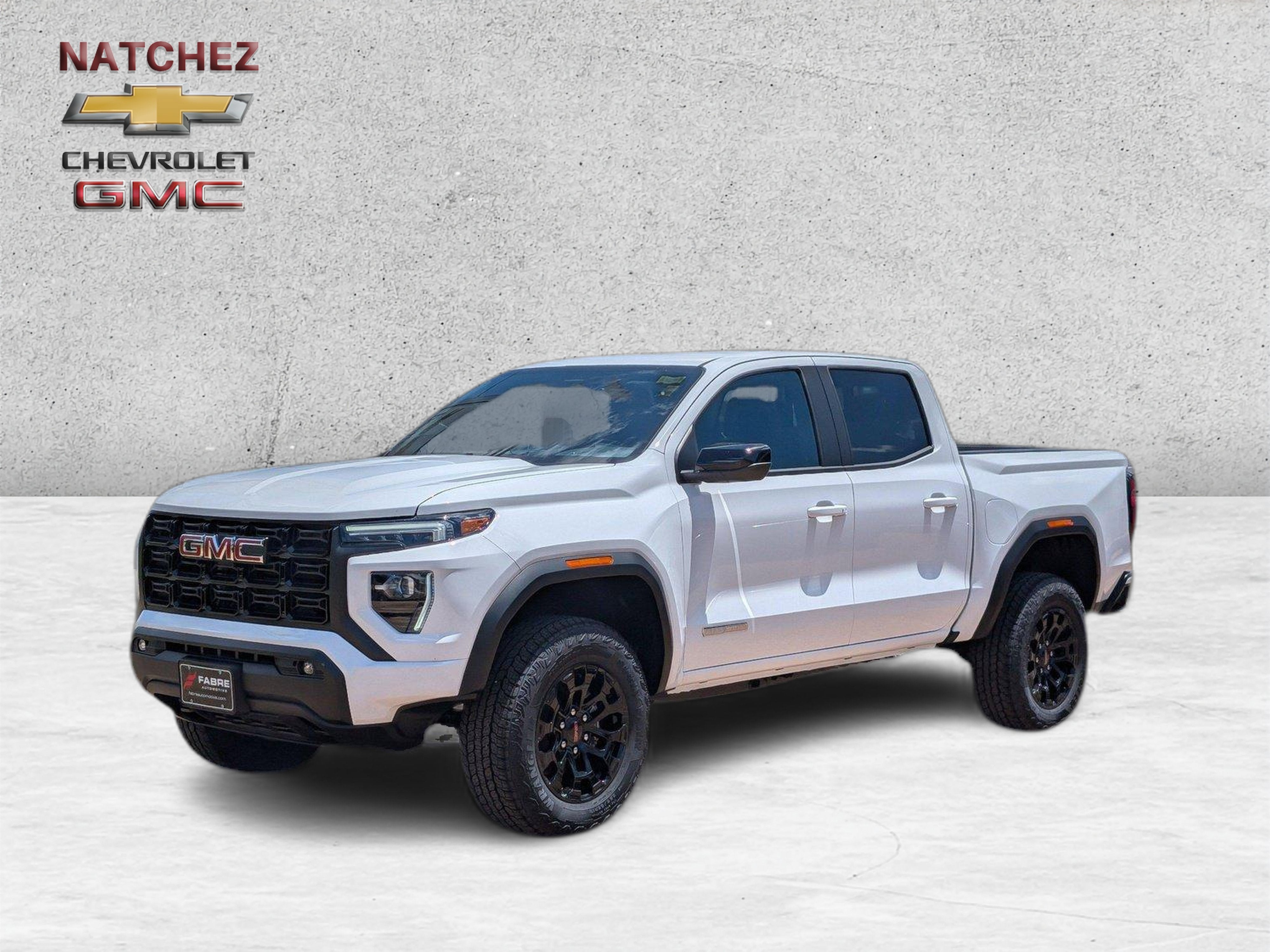 2026 GMC Canyon Elevation in Summit White — front three-quarter view