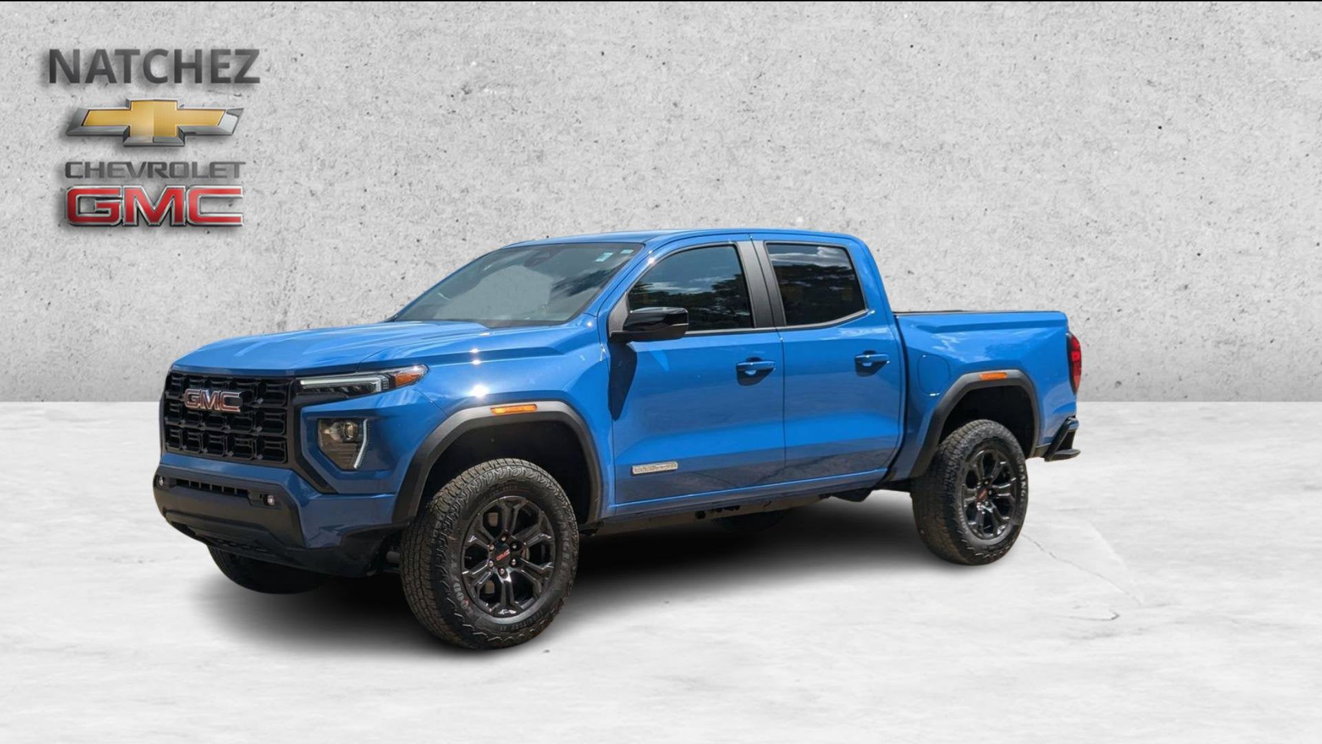 2025 GMC Canyon Elevation in Rapids Metallic — front three-quarter view