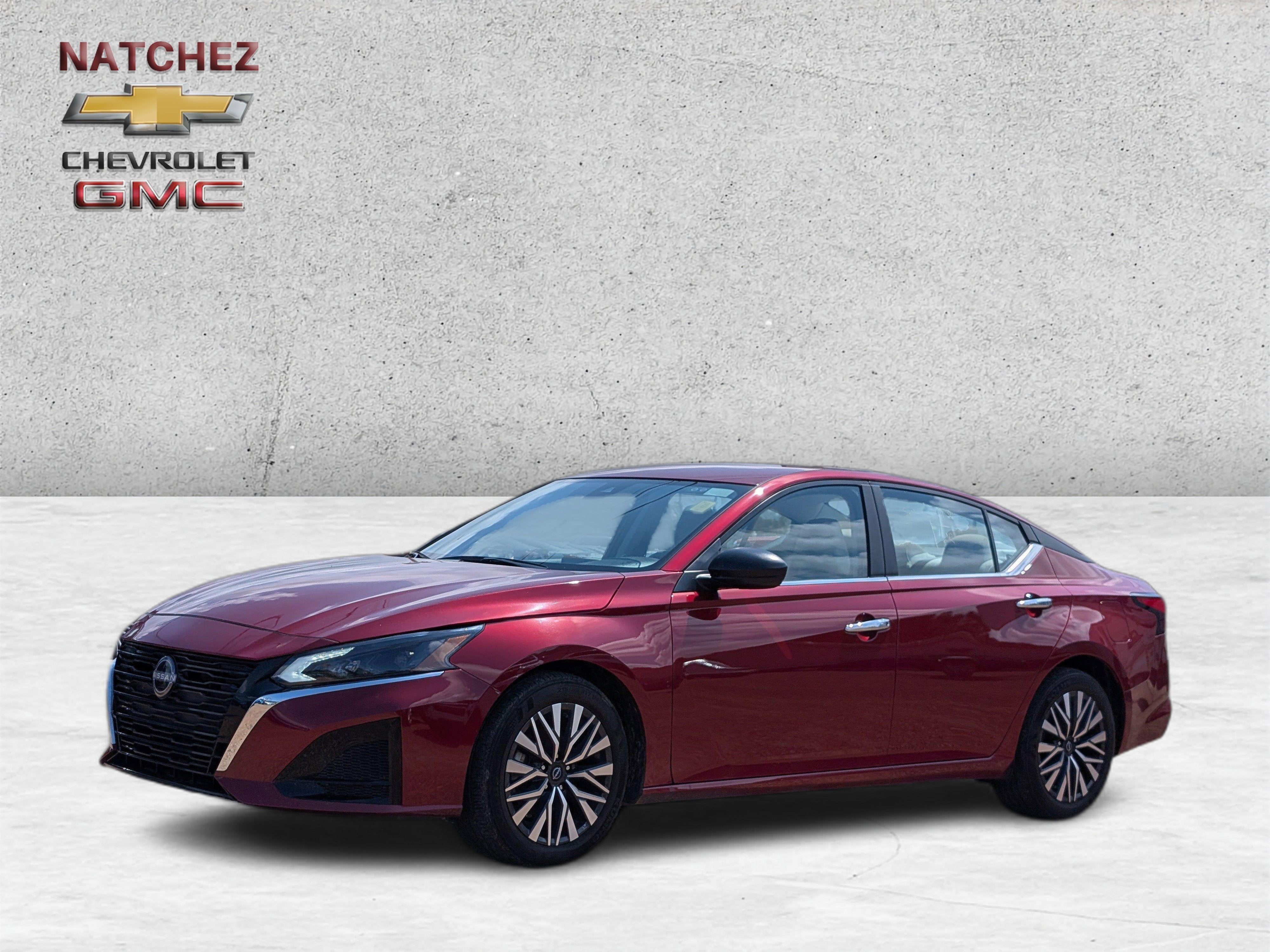 2025 Nissan Altima SV in Red — front three-quarter view