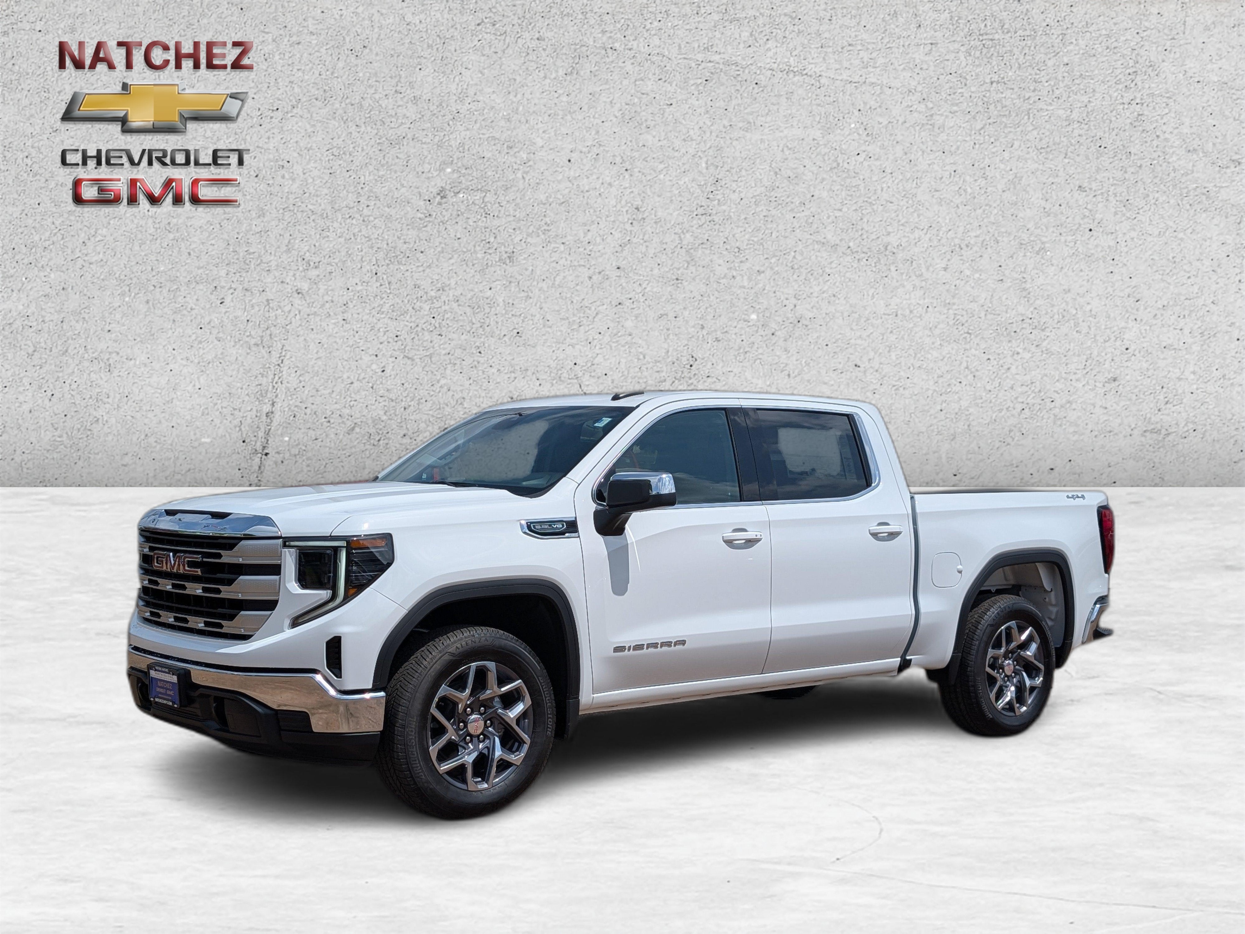 2026 GMC Sierra 1500 SLE in Summit White — front three-quarter view