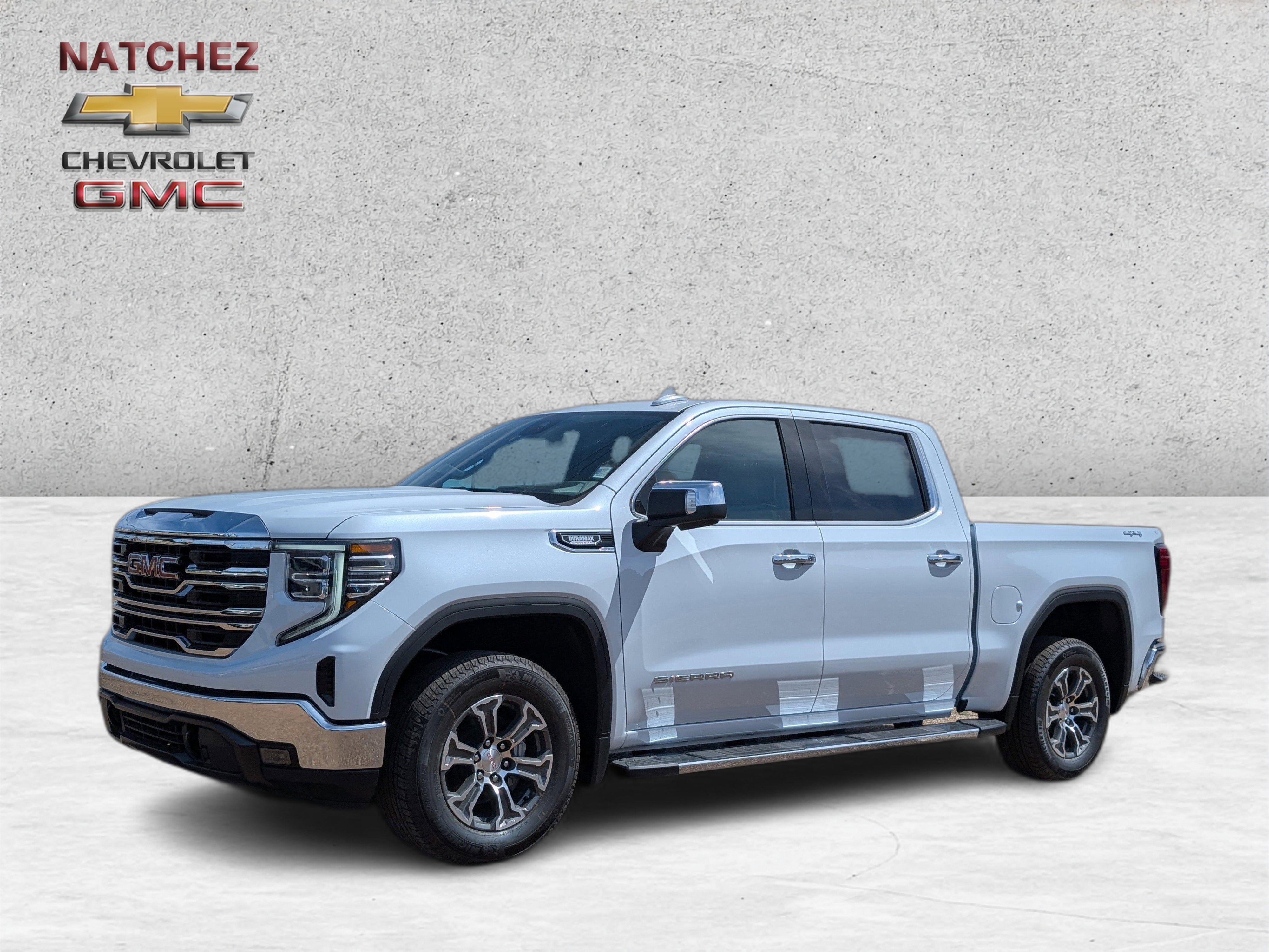 2026 GMC Sierra 1500 SLT in Glacier White Tricoat — front three-quarter view
