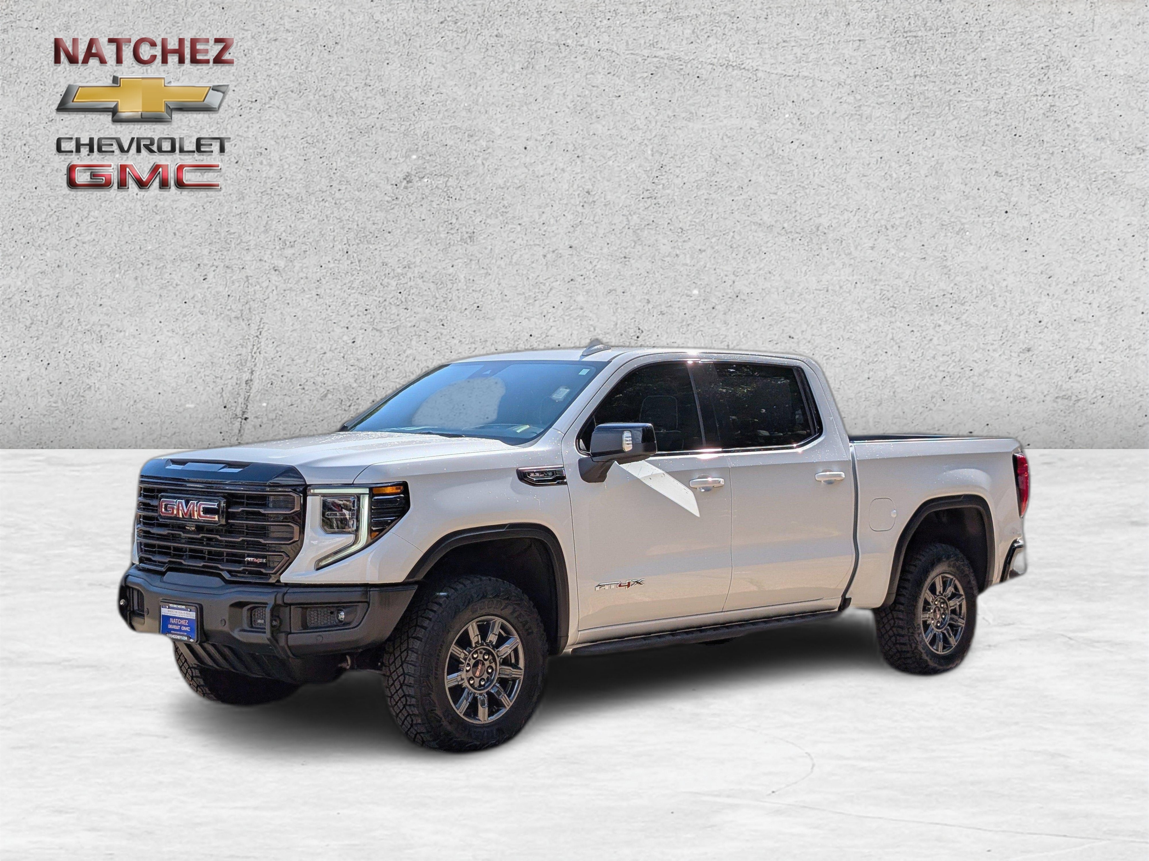 2026 GMC Sierra 1500 AT4X in Summit White — front three-quarter view