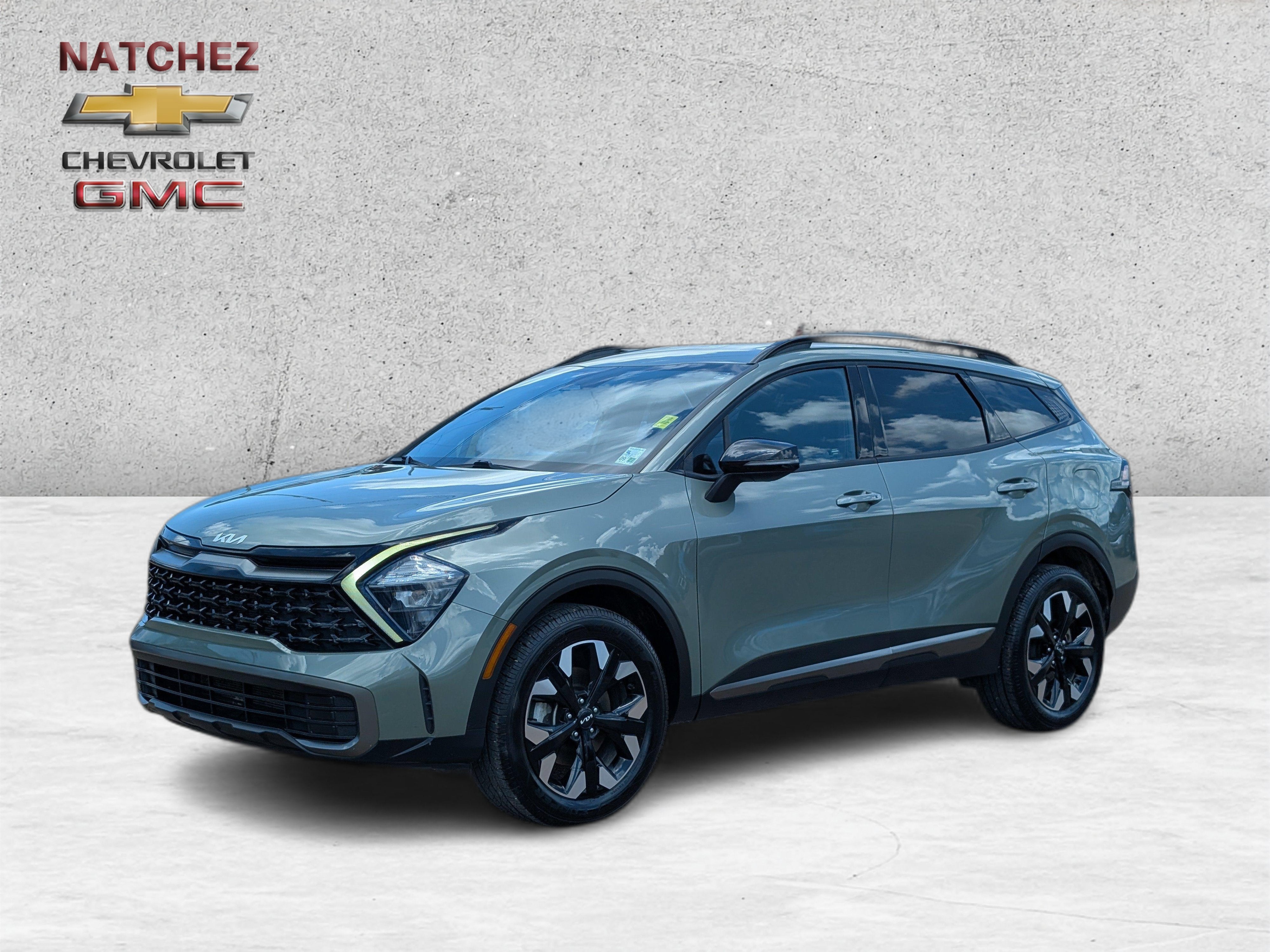 2023 Kia Sportage X-Line in Green — front three-quarter view